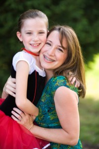 Angela Wright and daughter Angela Wright with one of her three kiddos